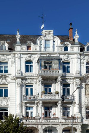 Téléchargez les photos : White facade of old historic house from the 19th century with balconies in Wiesbaden - en image libre de droit