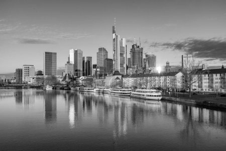 Photo for Scenic view to skyline of Frankfurt am Main with reflection of the skyline in river Main. - Royalty Free Image