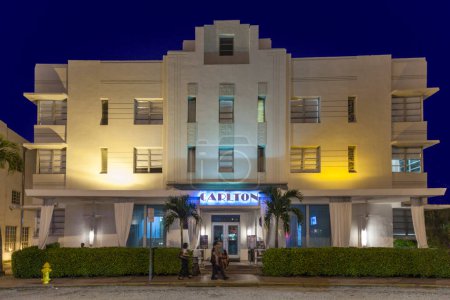 Photo for Miami, USA - August 2, 2010: Night view at Ocean drive with old famous Hotel Carlton in Miami Beach, Florida. Art Deco Night-Life and architecture in South Beach is one of the main tourist attractions in Miami. - Royalty Free Image