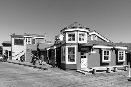 Photo for Santa Barbara, USA - March 16, 2019: historic  house at Santa  Barbara pier under blue sky. - Royalty Free Image