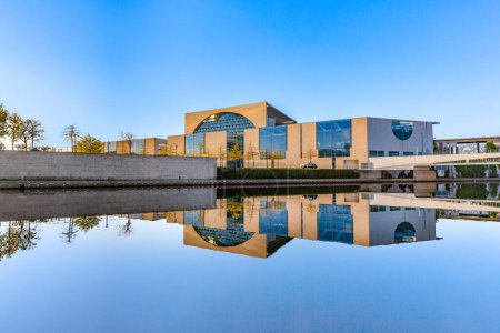 Photo for The german chancellery building at river Spree with reflection in early morning. - Royalty Free Image