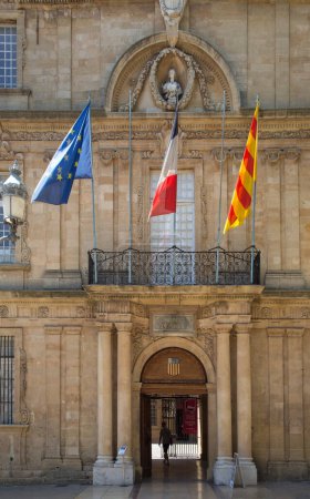 Photo for Aix en Provence, France - July 8, 2015: facade of Hotel de Ville in Aix en Provence with French, local and european Flag. - Royalty Free Image