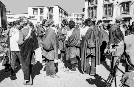 Photo for Lhasa, China - November 2, 1983: local people from the hills meet in the old part near the Jokhang palace in Lhasa, China. - Royalty Free Image