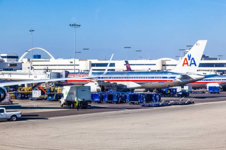 Photo for Los Angeles, USA - June 9, 2012:   American Airlines jet Boeing parking on gate position   in Los Angeles, USA. With 60 million passenger LAX is the third biggest airport in the US. - Royalty Free Image