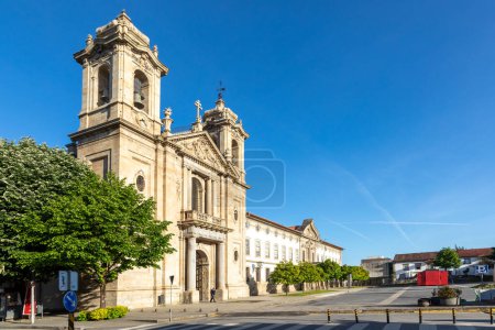Photo for Populo Church in Mannerist, rococo and neoclassical architecture style in Braga Portugal in early morning light with convento do populo beside - Royalty Free Image