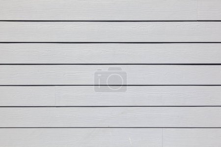Téléchargez les photos : Mur en bois gris avec structure en bois comme fond lumineux harmonique - en image libre de droit