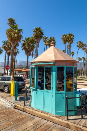Photo for Santa Barbara, USA - June 23, 2012: scenic view to historic wooden pier in Santa Barbara, USA with green painted entrance booth for cars. - Royalty Free Image