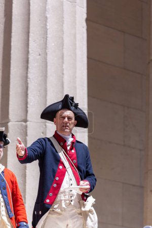 Photo for New York, USA - July 9, 2010: Ceremony for declaration of independence in old costumes takes place at the Washington statue in front of federal Hall National Memorial in New York, USA. - Royalty Free Image