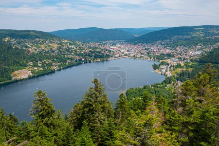 aerial view to the village of Gerardmer with lake and sailing boats, France