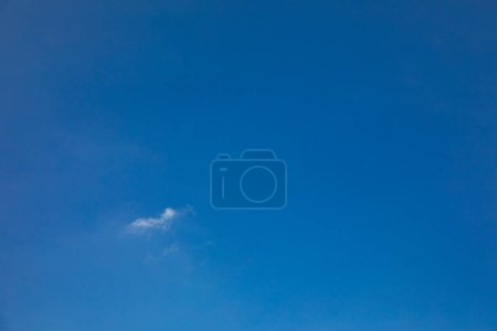 Photo for Blue clear sky with one very small cloud symbolizing harmony - Royalty Free Image