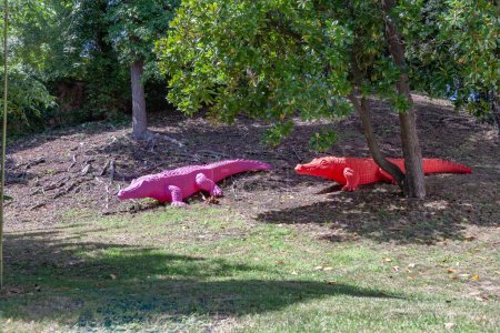 Photo for Vicenza, Italy - August 4, 2009: colorful painted plastic crocodiles at Villa alla scalette in Vicenza. The villa houses the art objects by atelier Medini. - Royalty Free Image