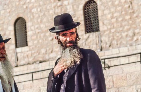 Photo for Jerusalem, Israel - January 1, 1995:   Orthodox jewish man prays at the Western Wall in Jerusalem, Israel. Israel's annexation of East Jerusalem in 1967, including the Old City, was never internationally recognized. - Royalty Free Image