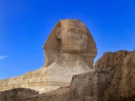 Photo for Full profile of Great Sphinx  on a clear sunny, blue sky day in Giza, Cairo, Egypt with no people - Royalty Free Image