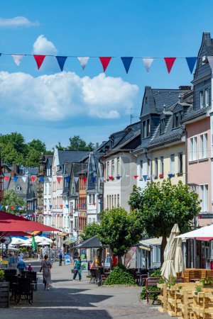 Photo for Montabaur, Germany - June 15, 2023: people enjoy visiting old town of Montabaur with lovingly restored half-timbered buildings from the 16th and 17th centuries. - Royalty Free Image