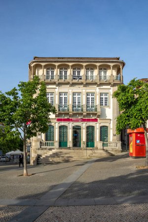 Photo for Chaves, Portugal - May 2, 2023: Building of the former branch of the Sotto Mayor Bank in Largo do Arrabalde in Chaves at Santa Maria Maior square. - Royalty Free Image