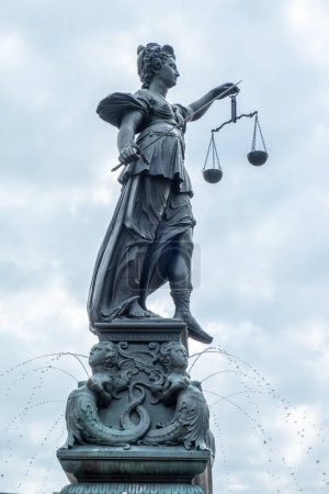 Photo for Frankfurt, Germany - August 16, 2023: lady justice at the fountain at the Roemer square in Frankfurt, Germany - Royalty Free Image
