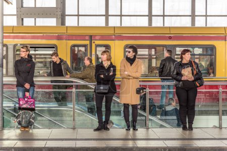 Photo for Berlin, Germany - October 27, 2014: peope travel at Alexanderplatz subway station in Berlin, Germany. Its a large public square and transport hub in the central Mitte district. - Royalty Free Image