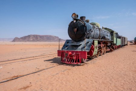Photo for Old abandoned historic locomotive in the desert near Wadi Rum, Jordan - Royalty Free Image