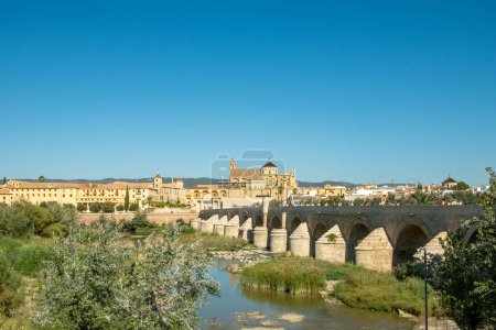 Photo for Historic Roman Bridge and Mezquita - Great Mosque - Cathedral on the Guadalquivir River - Royalty Free Image