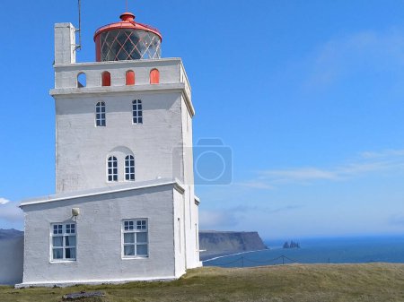 Photo for The famous Dyrholaey Lighthouse is a lighthouse located on the central south coast of Iceland - Royalty Free Image