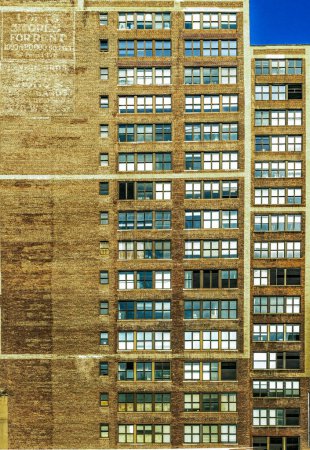 Photo for Brick wall facade with windows of historic industrial building in New York - Royalty Free Image