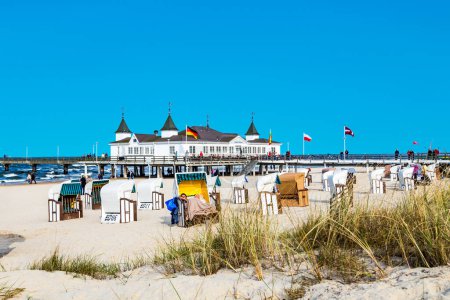 Photo for View to pier at Ahlbeck with beach and roofen wickered beach cha - Royalty Free Image