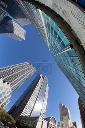 Photo for Dallas, USA - November 6, 2023: fisheye view of historic skyscraper in old town od Dallas under blue sky. - Royalty Free Image