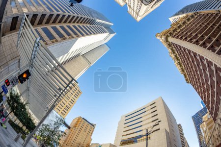 Photo for Dallas, USA - November 6, 2023: fisheye view of historic skyscraper in old town od Dallas under blue sky. - Royalty Free Image
