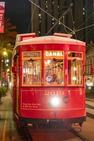 Photo for New Orleans, USA - October 25, 2023: people in New Orleans use the street car in early morning to go to town and work. - Royalty Free Image