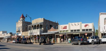 Photo for Fredericksburg, USA - November 1, 2023: The Main Street in Frederiksburg, Texas, also known as The Magic Mile, with retail stores and people walking. - Royalty Free Image