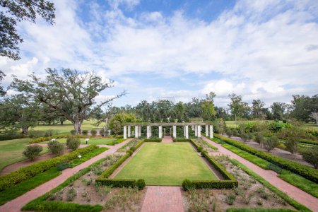 Photo for Vacherie, USA - October 27, 2023: garden at oak alley Plantation in Vacherie, Texas. The plantation  serves nowadays as a museum to show the history of slavery and southern mansions. - Royalty Free Image