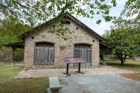 Photo for Vacherie, USA - October 27, 2023: old Blacksmith shop at Whitney Plantation in Vacherie, Texas. The plantation operated from operated from 1752-1975 and serves nowadays as a museum to show the history of slavery. - Royalty Free Image