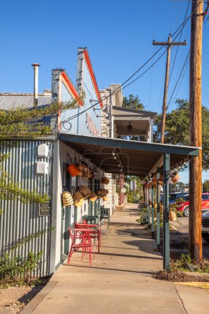 Photo for Fredericksburg, USA - November 1, 2023: porch at the Main Street in Fredericksburg, Texas, also known as The Magic Mile, all built in wooden vintage western style - Royalty Free Image