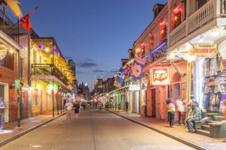 Photo for New Orleans, USA - October 24, 2023: Pubs and bars with neon lights in the French Quarter, downtown New Orleans.. - Royalty Free Image