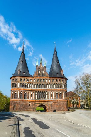 famous Holsten Tor - engl. Holsten gate - in Luebeck, the  landmark for the town, Germany
