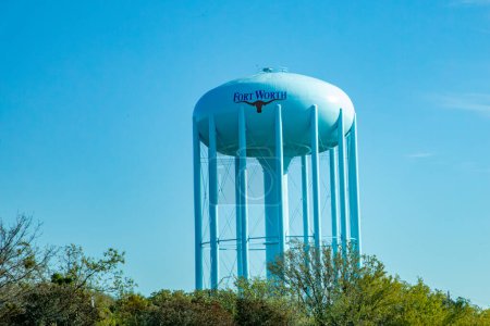 Photo for Water tank and tower in Fort Worth with the typical longhorn under the name, Texas, USA - Royalty Free Image