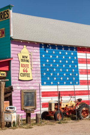Photo for Seligman, USA - May 25, 2022: vintage historic souvenir shop at route 66 with stars and stripes painted at  facade as decoration in Seligman, USA. - Royalty Free Image