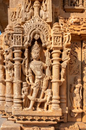 Ancient bas-relief of famous Neminath Jain temple in Ranakpur, Rajasthan state of India