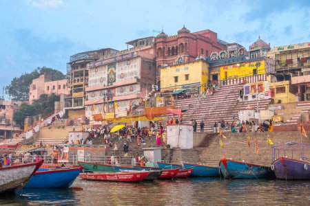 Photo for Varanasi, India - February 24, 2024:  people follow their deat cult procession at the border of holy river ganges at a gath in Varanasi. - Royalty Free Image