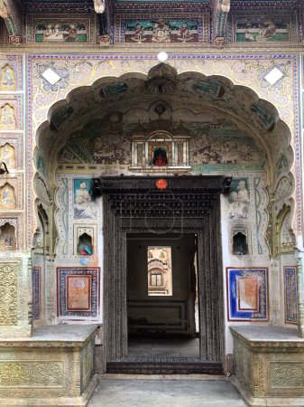 colorful decorated scenic door of an old building in Mandawa, India
