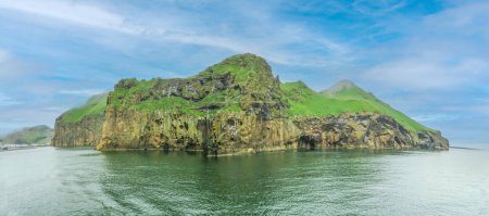 scenic view to Heimaey, the largest of the westman islands. Tthe westman archipelago is a bit west of Icelands southern area.