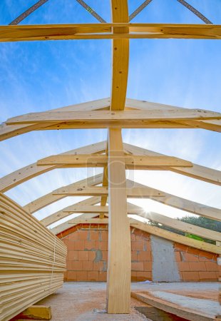 Photo for Detail of wooden roof construction with missing shingles at the construction site - Royalty Free Image