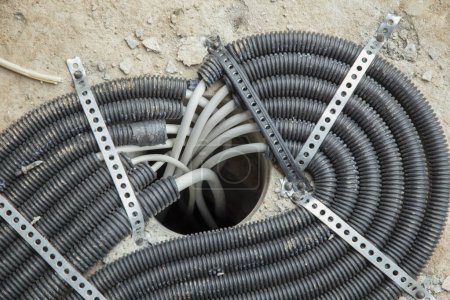 detail of electric cable at a construction site in detail at the concrete floor
