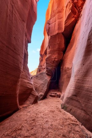 Wind Pebble slot canyon near Page Arizona highlights the narrow passageway and amazing, intricate patterns that form over millions of years from the combination of water and sediment flow.