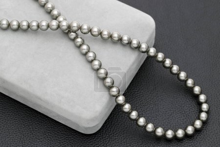 Photo for Elegant black pearl necklace on black background - Royalty Free Image