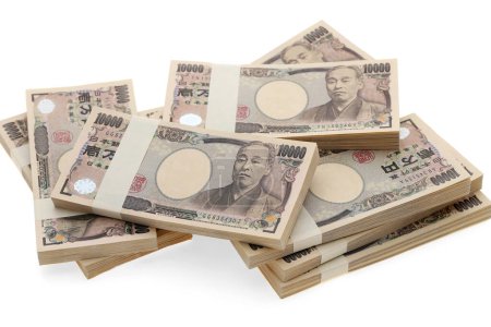 Photo for Stack of Japanese yen. 10,000 yen bundle of bills. The banknotes are written as "10,000 yen" in Japanese. - Royalty Free Image