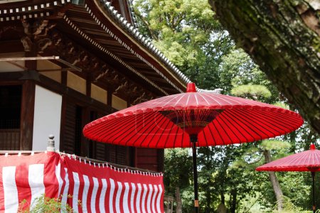 Photo for Red umbrella and used in Japanese green tea ceremony - Royalty Free Image
