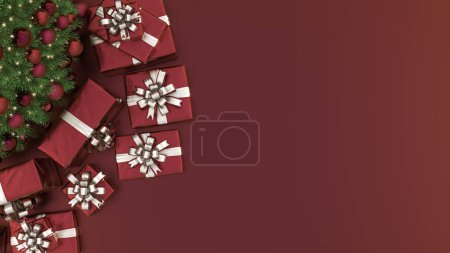 Christmas tree with red decorations and gifts, on a red background. Christmas background with copy space for text, top view. 