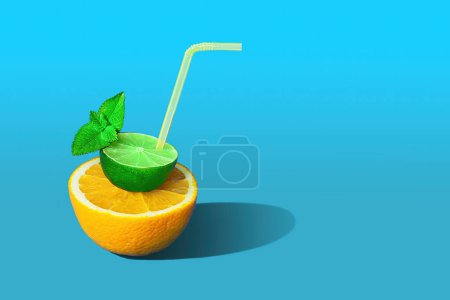Creative banner of a lime half placed on an orange slice with a straw and mint leaf, against a blue background., smoothie, fresh juices, summer drinks for refresh
