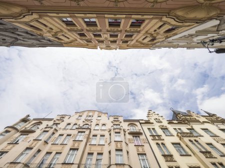 building, two parallel old historical buildings with selective focus over beautiful blue sky with copy space. residential apartments over sky in Europe. architectural background concept